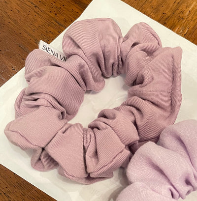Beau (smaller than the classic size) bamboo hair scrunchie in Lilac, handmade by Siena Vida, a women founded company in Toronto, Canada with a goal of transforming hair accessories to being more environmentally friendly & durable. Bamboo is buttery soft, the perfect addition to your fave matching sweat suit.