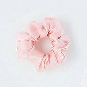Petal Pink silk hair scrunchie. Classic silk scrunchies are made of 100% silk from up-cycled Italian silk sourced from the Toronto Fashion District. Deadstock that would have otherwise ended up in the trash! Silk is very gentle on your hair! All hair scrunchies are handmade by Siena Vida, a women founded company in Toronto, Canada with a goal of transforming hair accessories to being more environmentally friendly & durable.