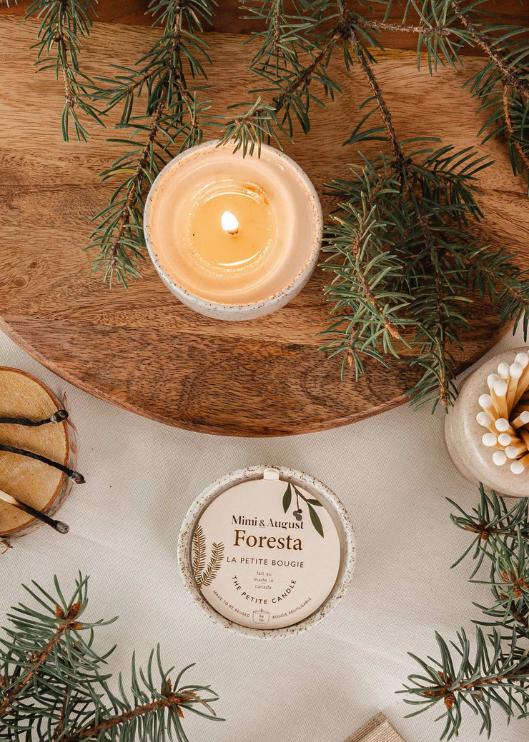 Foresta, non-toxic hand poured soy wax candle from Mimi & August in Montreal, Quebec. Comes in a reusable ceramic pot. Foresta transports you to a quiet forest of fir trees. 