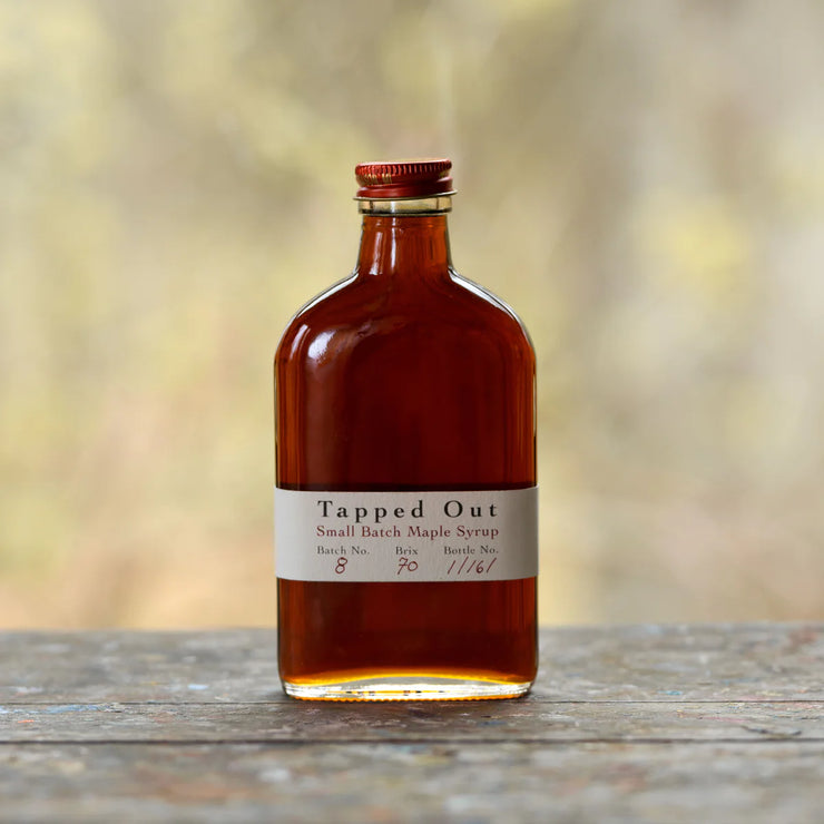 Batch No. 08 of Tapped Out Small Batch Maple Syrup from Graeme Foers. Made the traditional way in Egbert, Ontario. This is a Very Dark Maple Syrup Molasses mingle with smoke to finish. The right maple for your evening cocktail.