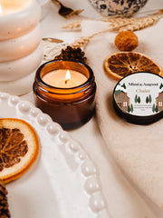 Chalet soy wax candle with notes of cardamom, tobacco flower, spices. Mini 2oz non-toxic soy wax candles in seasonal fall & winter scents.   Mimi & August soy wax candles are hand-poured in small batches in Montreal, Quebec. Phthalate and Paraben free, they are also 100% vegan.