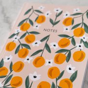 Orange Trees Notebook. There's nothing quite like a fresh notebook! Juicy, ripe oranges are the inspiration for this beautiful notebook from Mimi & August in Montreal, Quebec. Perfect for writing down your thoughts, lists, plant purchases, doodles. Printed in Montreal and on recycled paper.