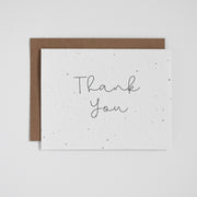 "Thank You". Our plantable greeting cards are designed and printed in Guelph, Ontario by The Good Card. Their paper is all Canadian made. Kind words that come with a little something extra - flowers!  Plantable seed paper cards are made from bio-degradable, post-consumer waste meaning no new trees are harmed. Each card is full of a blend of 6 different wildflower seeds, that are all tested for purity, non-GMO, and non-invasive. All cards are printed with non-toxic ink