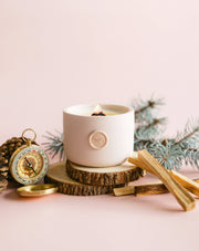 The Wanderer coconut soy wax candle. Hand poured in Toronto by Pinky Swear & Co. Non-toxic, sustainably made. Spruce & Sandalwood  For the traveler, the adventurer, the nature lover - THE WANDERER boldly blends fresh spruce and earthy sandalwood fragrances with crisp and gentle floral notes of rose and lemon flower. Like a walk through the majestic northern forest, this enticing candle transports your senses to the great outdoors.