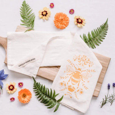 Handmade organic cotton golden bee tea towel from Your Green Kitchen in Nakusp, British Columbia. Your Green Kitchen is a woman founded & owned business that creates beautiful eco-friendly and toxin-free products for your home.  Made with 100% GOTS organic unbleached cotton, super absorbent and washes like a dream.